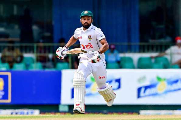 Shadman leads Bangladesh's batting with a score of 46 amidst rain delays.